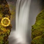 Skogafoss waterfall winter vertical