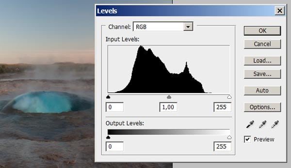 The levels histogram has three sliders