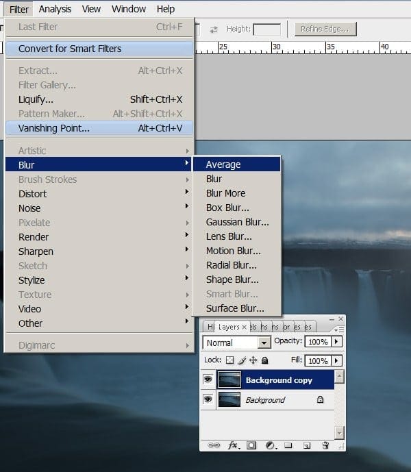 Apply an 'average blur' to the top layer.in photoshop