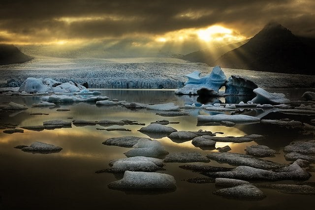 Sunburst over Fjallsarlon lagoon.