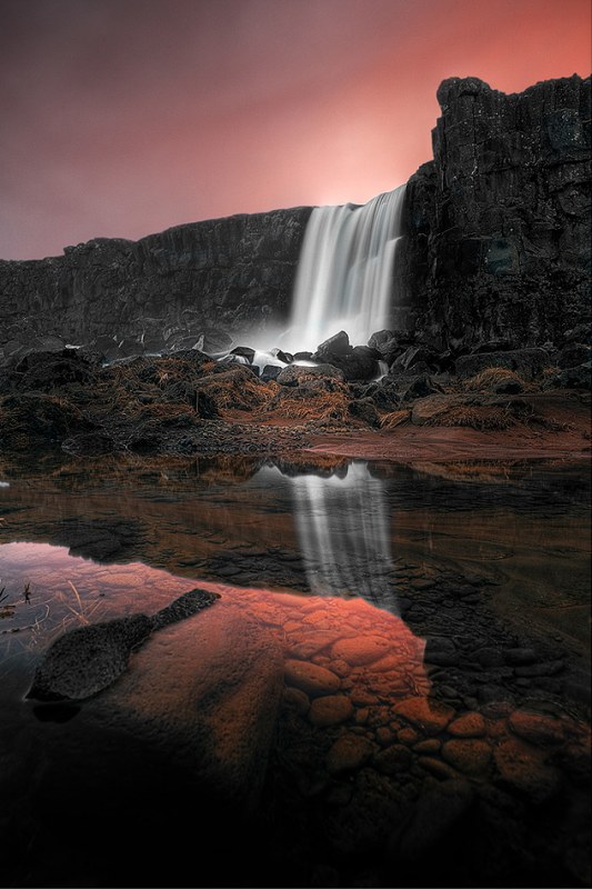 Vertical Reflections at Oxararfoss Waterfall.