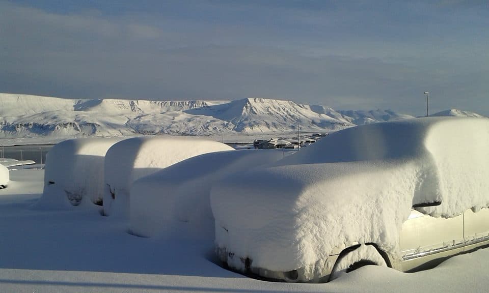 Rental car buried in snow